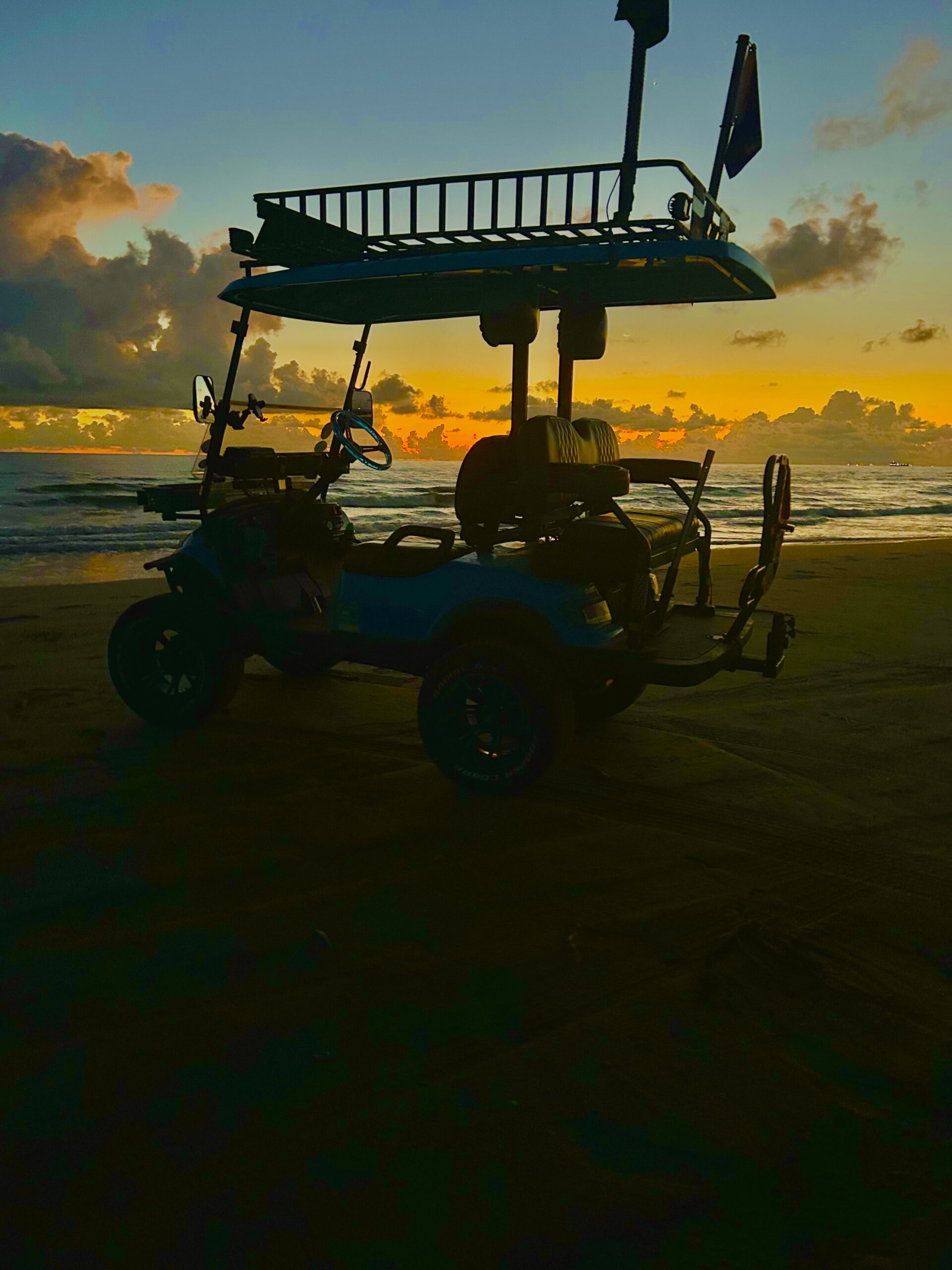Golf cart at sunset