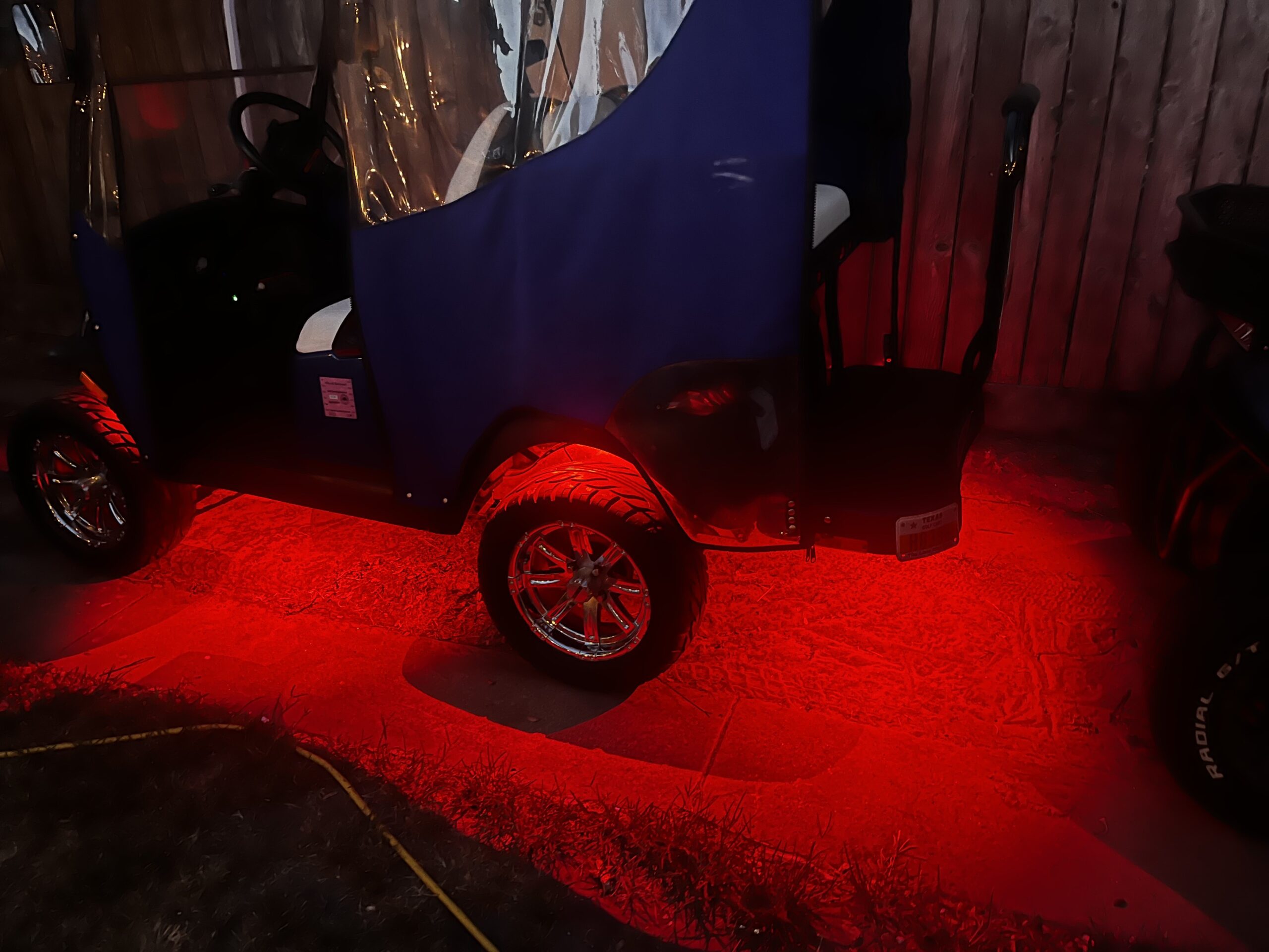 Golf cart with red lighting